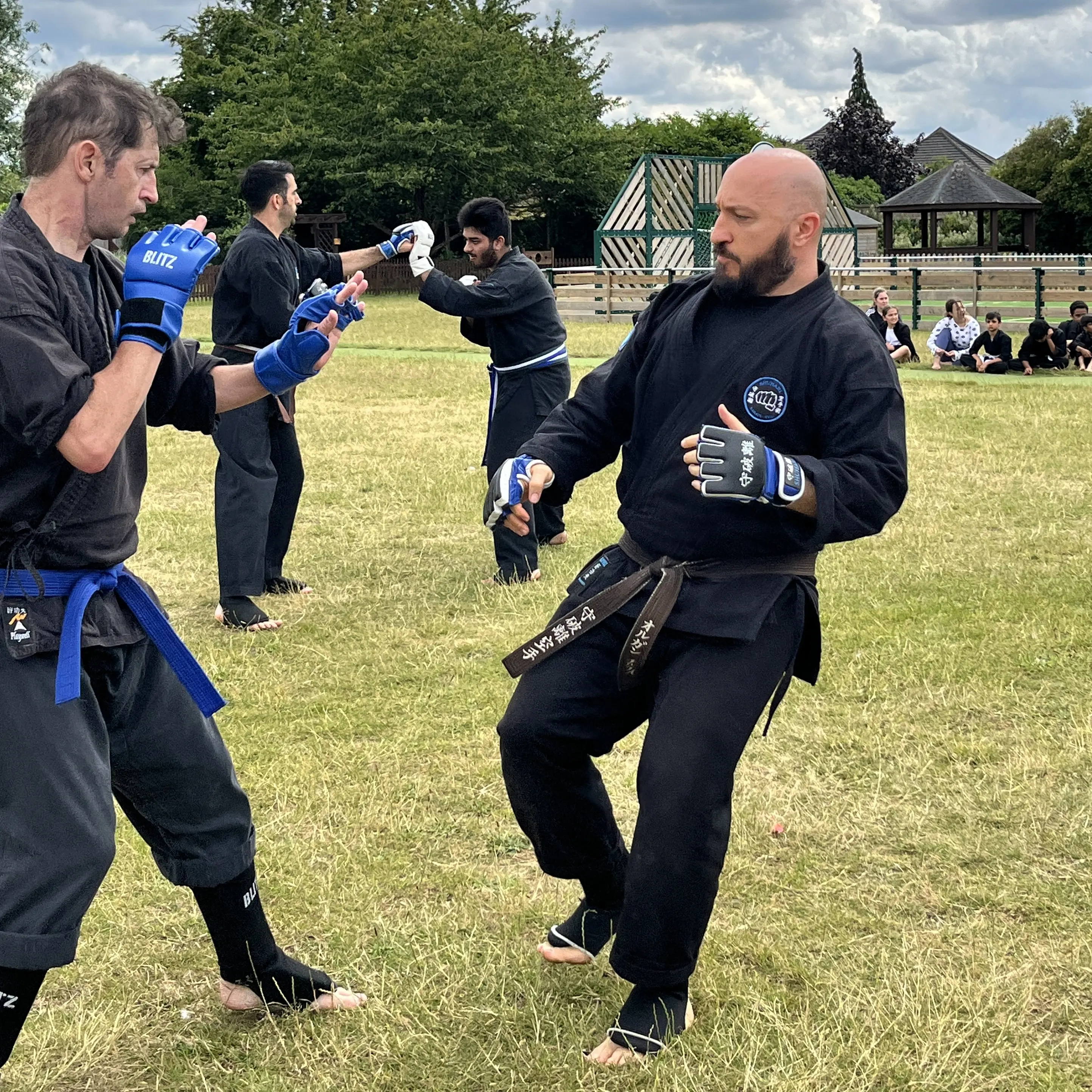 Olgun Tiltay of  Shuhari Self Defence sparring during a karate class in Maidenhead